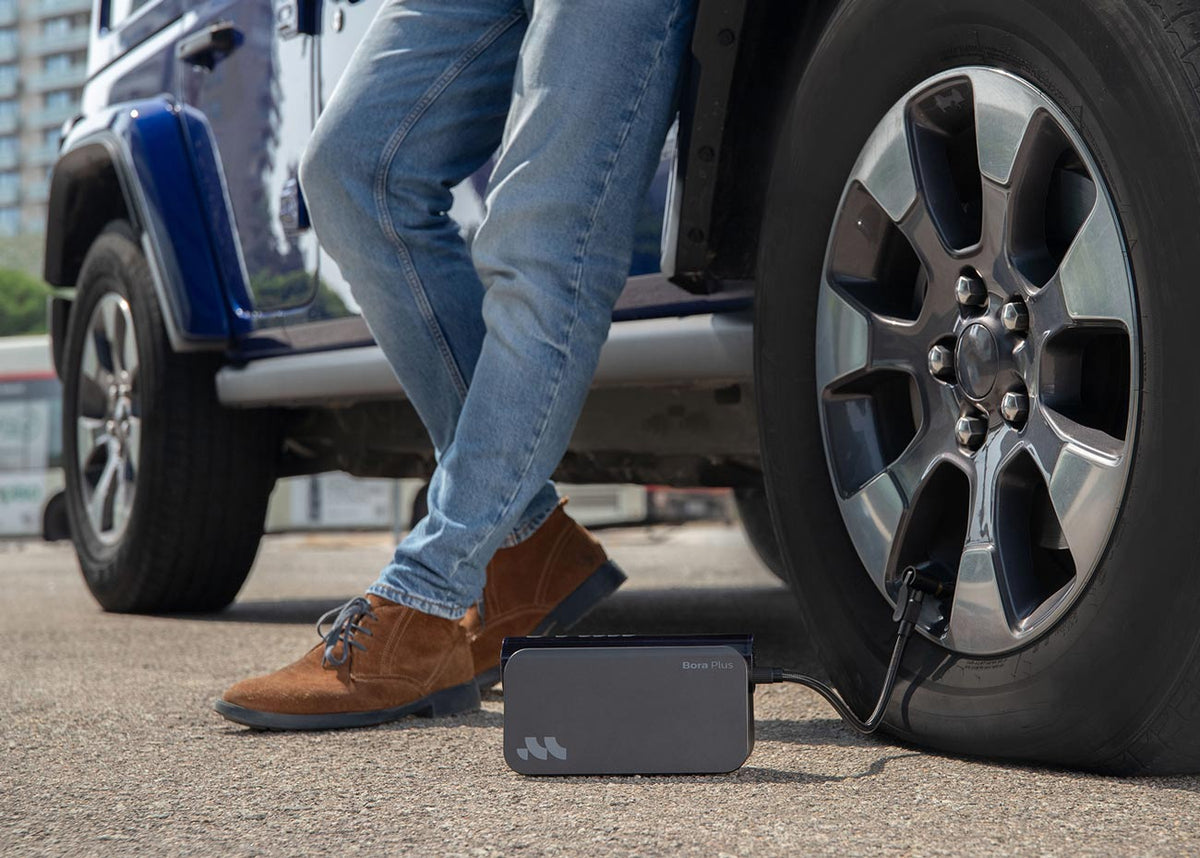 Woowind Bora Plus inflating an SUV tire