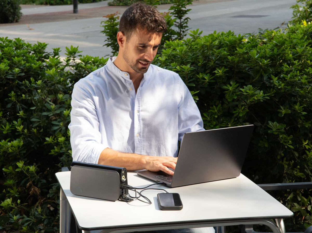 Bora Plus supplying power to a laptop outdoors